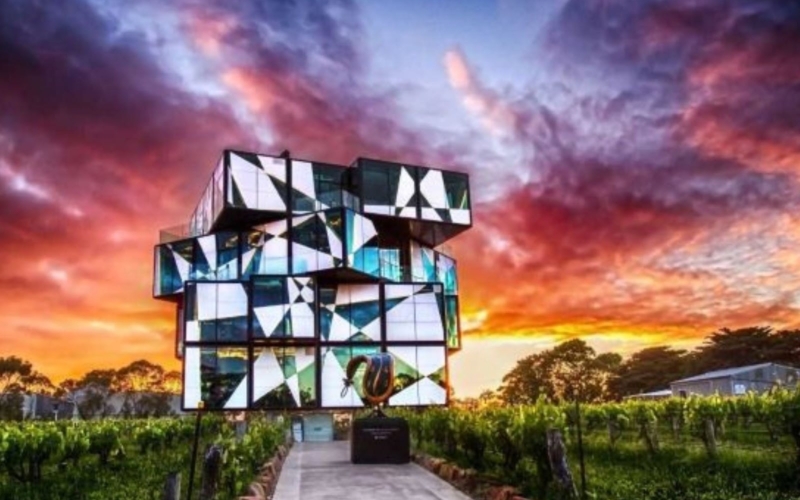 The d'Arenberg Cube  surrounded by vineyards at sunset