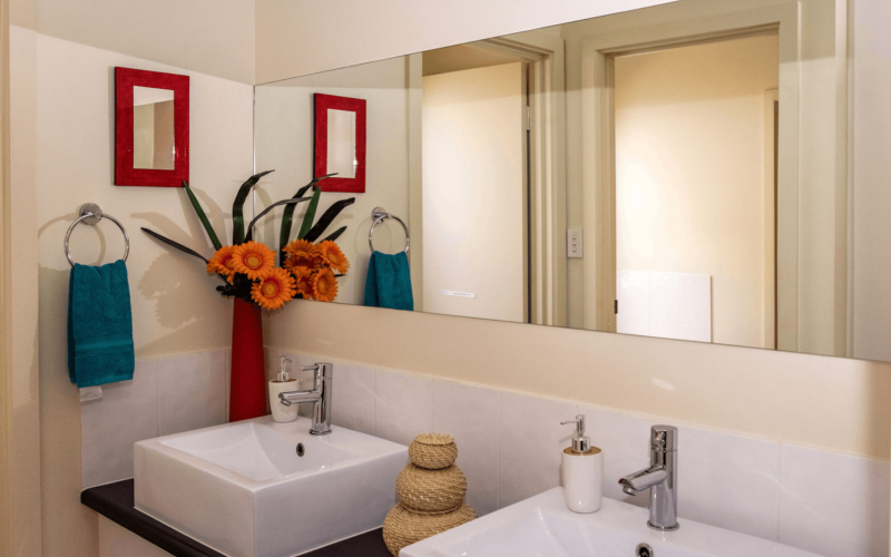 Vanity room with twin sinks